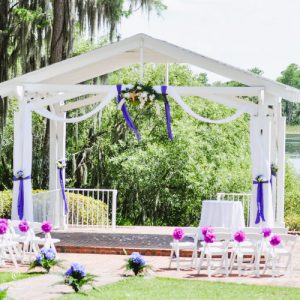 Orlando destination wedding at Cypress Grove showing decorated pergola