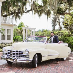 Cypress Grove Orlando wedding photo showing vintage car and groom