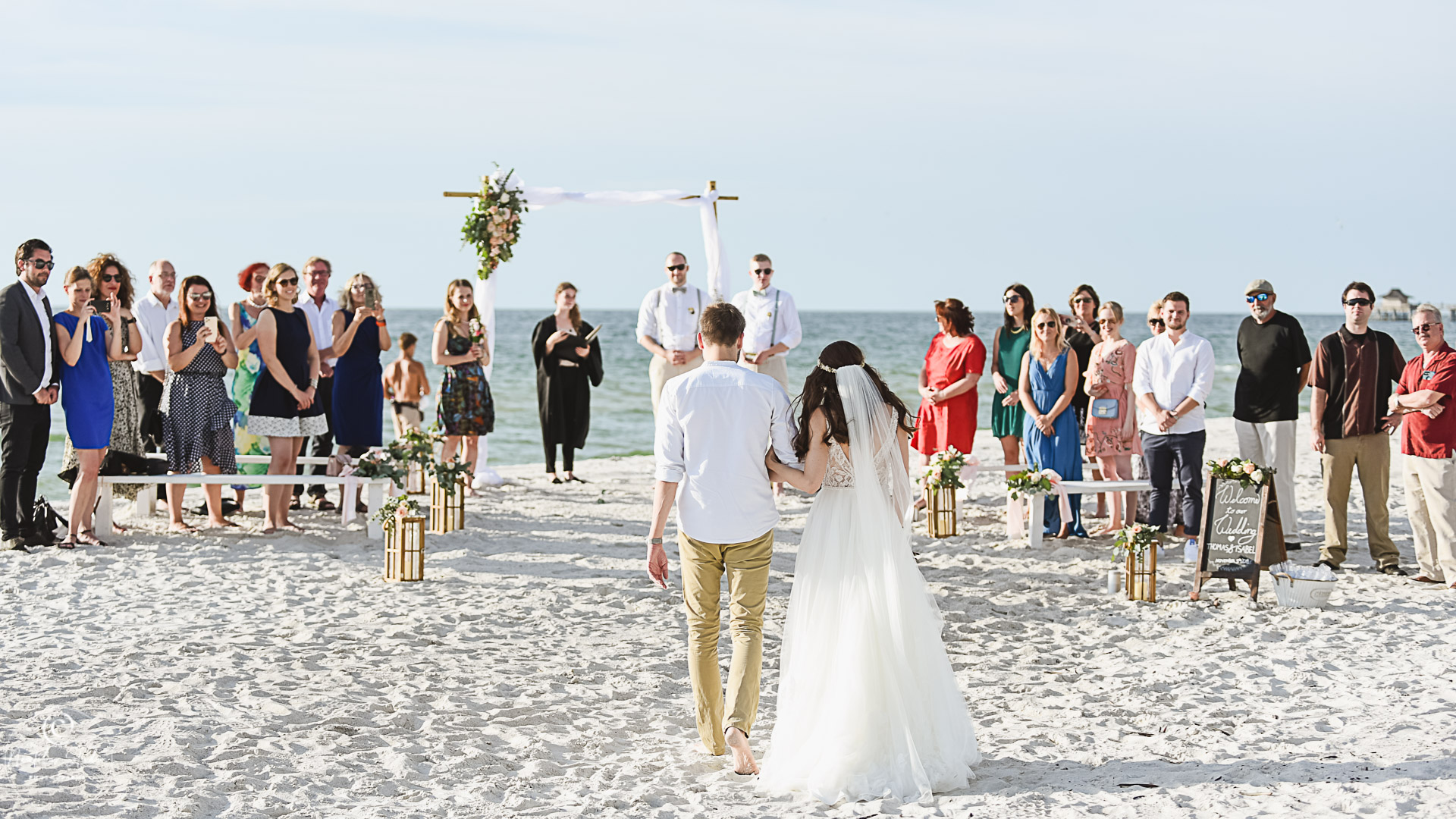 Photo showing elopement wedding in Naples on the beach
