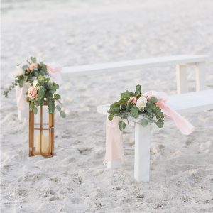 white wooden benches wedding ceremony