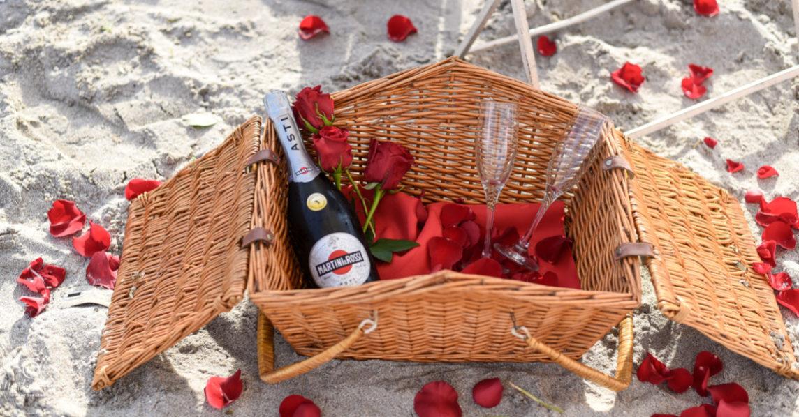 Picnic basket with champagne bottle