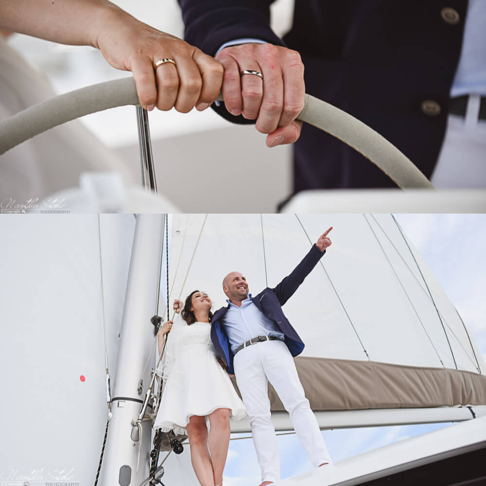 Photo of couple sailing at their Florida sailboat wedding