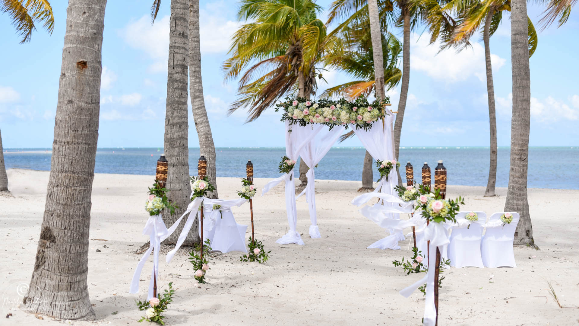 Florida beach wedding packages photo of luxury wedding set up