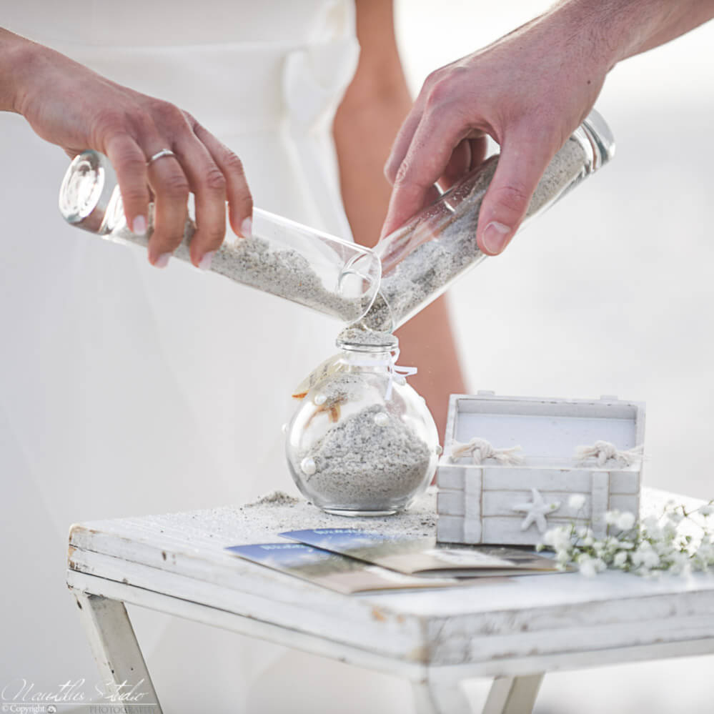 Photo of sand ceremony included in our Florida beach wedding packages