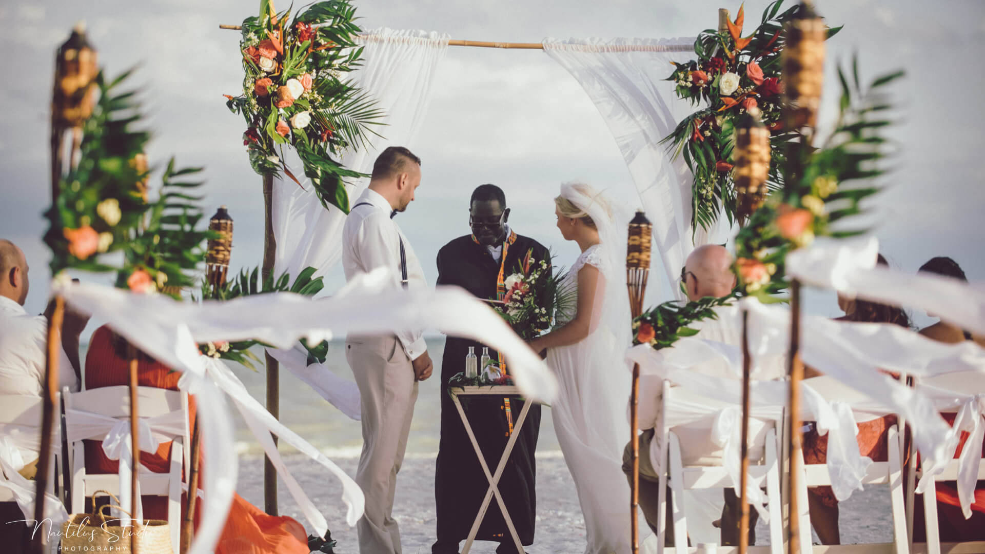 Photo of wedding ceremony on Sanibel Island with tropical flower decoration