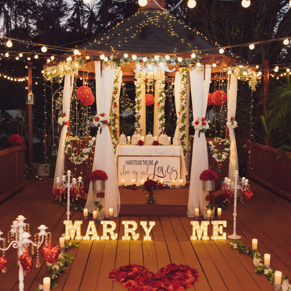 Photo of Proposal package in Tampa at a private location. Photo shows a lighted and decorated gazebo in the evening