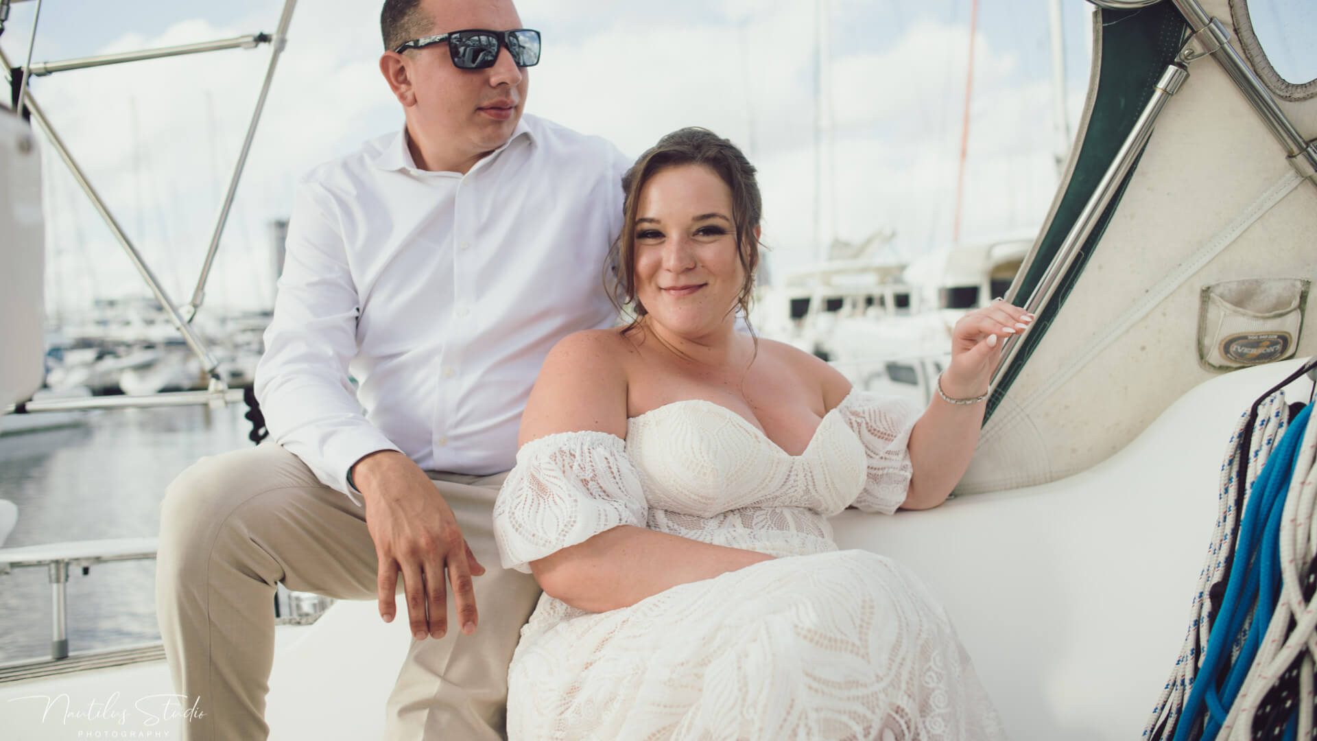 Exclusive sailboat Elopement, photo of bride and groom enjoying the sail